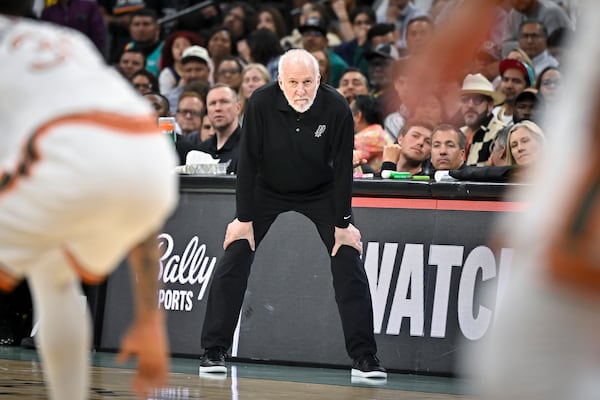 FILE - San Antonio Spurs coach Gregg Popovich watches play during the second half of the team's NBA basketball game against the Golden State Warriors, Sunday, March 31, 2024, in San Antonio. (AP Photo/Darren Abate, File)