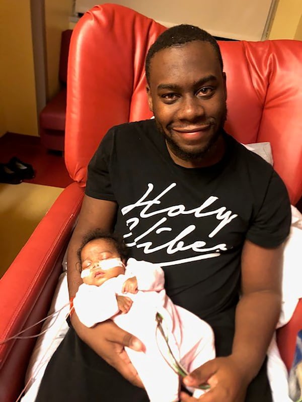 Jonathan Jones has worked from Children's Healthcare of Atlanta since November so he could always be available for twins Ava and Averie. The girls were delivered early, and both needed heart surgery.
Photo courtesy of the Jones family