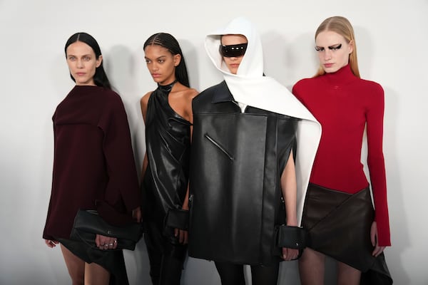 Models wear backstage creations as part of Courreges Fall/Winter 2025-2026 Womenswear collection presented Wednesday, March 5, 2025. in Paris. (Photo by Scott A Garfitt/Invision/AP)