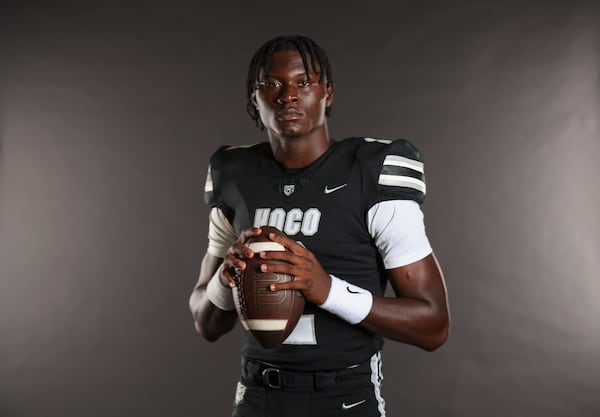 2024 AJC Super 11 Houston County quarterback AJ Hill at Houston County high school, Thursday, July 25, 2024, in Warner Robins, Ga. Hill is a 4-star quarterback in the class of 2025 and a Memphis verbal commitment. (Jason Getz / AJC)
