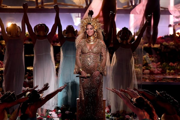 Beyoncé performs at the 59th annual Grammy Awards on Feb. 12, 2017, in Los Angeles. KEVIN WINTER/GETTY IMAGES FOR NARAS