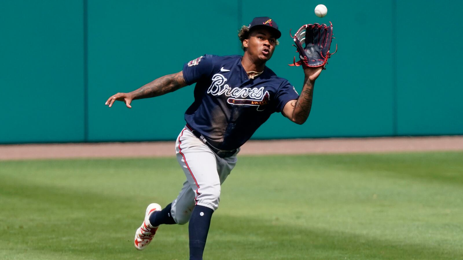 Braves center fielder Cristian Pache makes a running catch on a fly ball by Minnesota Twins' Josh Donaldson in the fifth inning Monday, March 22, 2021, in Fort Myers, Fla. (John Bazemore/AP)