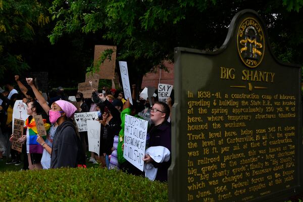 Demonstrators gather across the street from a Confederate-era memorabilia shop during a protest held Friday, June 5, 2020, in Kennesaw. Protests around the nation are occurring to protest the killing of George Floyd in Minneapolis police custody. JOHN AMIS FOR THE ATLANTA JOURNAL-CONSTITUTION