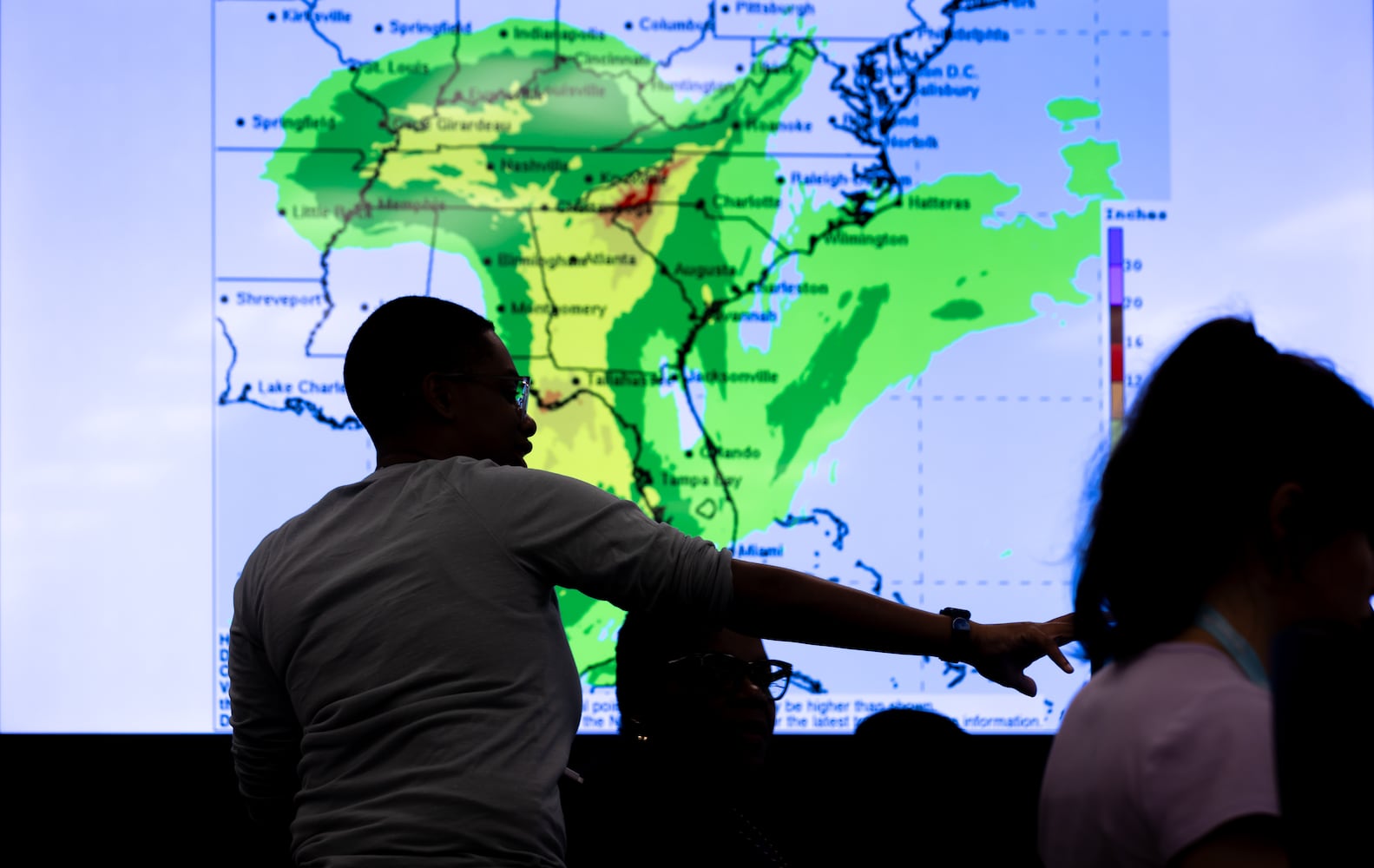 FEMA team members coordinate resources Thursday, Sept. 26, 2024 at the FEMA Regional Response Coordination Center in DeKalb County. Hurricane Helene will make landfall as a major storm along Florida’s Big Bend region Thursday evening, and its impact will be felt throughout Georgia. As of Thursday morning, the storm is still swirling in the eastern Gulf of Mexico as a strong Category 1 hurricane with sustained windspeeds of 90 mph, according to the National Hurricane Center. (John Spink/AJC)