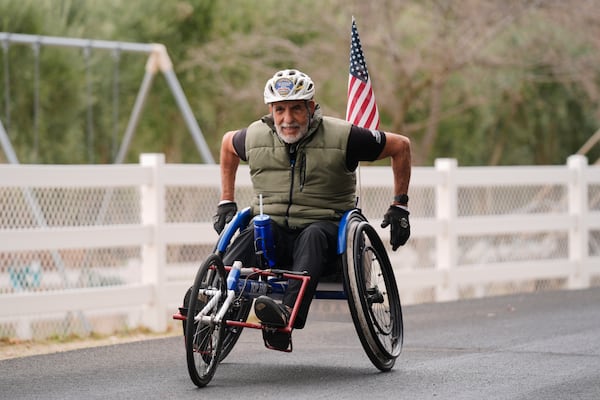 Rick Bingham, 87 trains for the LA Marathon on a wheelchair on his ranch in Lake Elsinore, Calif., Tuesday, March 11, 2025. (AP Photo/Damian Dovarganes)