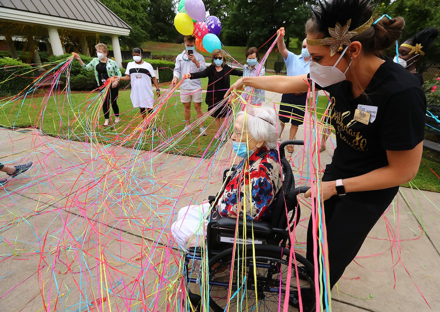 Photos: COVID-19 survivor celebrates 100th birthday