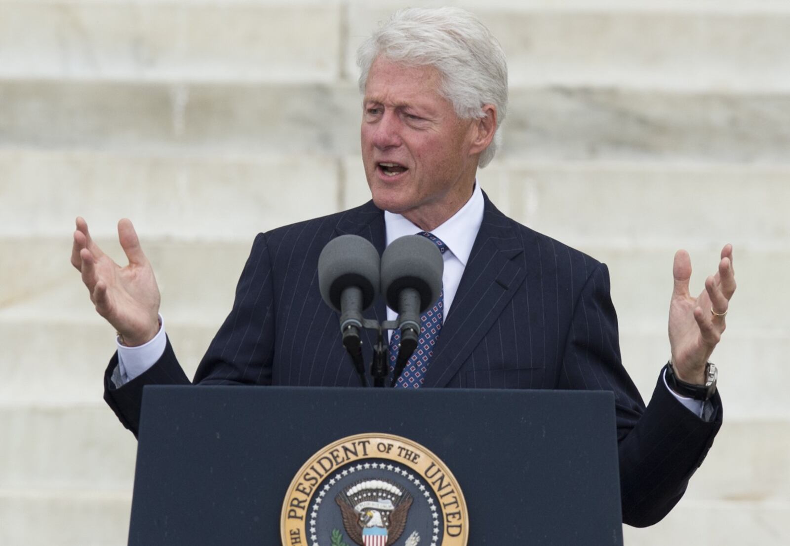 Former US President Bill Clinton speaks during the Let Freedom Ring Commemoration and Call to Action to commemorate the 50th anniversary of the March on Washington for Jobs and Freedom at the Lincoln Memorial in Washington, DC on August 28, 2013. Thousands will gather on the mall on the anniversary of the march and Dr. Martin Luther King, Jr.'s famous "I Have a Dream" speech. AFP PHOTO / Saul LOEB (Photo credit should read SAUL LOEB/AFP/Getty Images)