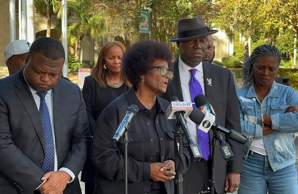 FILE - Mary Cure speaks to reporters flanked by her family's attorneys, Harry Daniels, left, and Ben Crump, right, at a news conference Tuesday, Dec. 5, 2023, in Woodbine, Ga., announcing their intention to file suit against the Camden County Sheriff's Office for the death of her son, Leonard Cure. (AP photo/Russ Bynum, File)