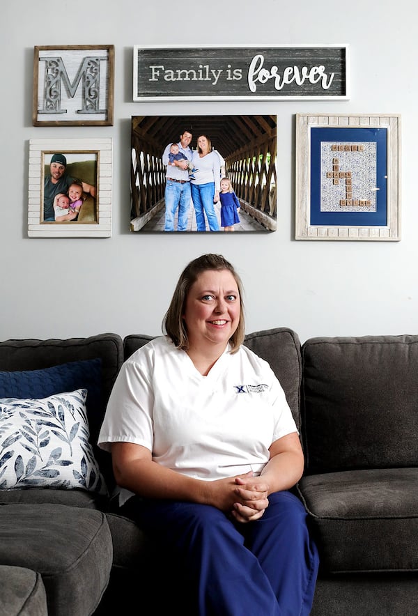 Kara McGee was a Columbus City Schools teacher raising her two children with her husband, Brad, until he was diagnosed with pancreatic cancer and died at the age of 40. Now, as a single mom, she decided to make a career change and begin studying to become an oncology nurse to serve families just like her own. (Fred Squillante/Columbus Dispatch/TNS)