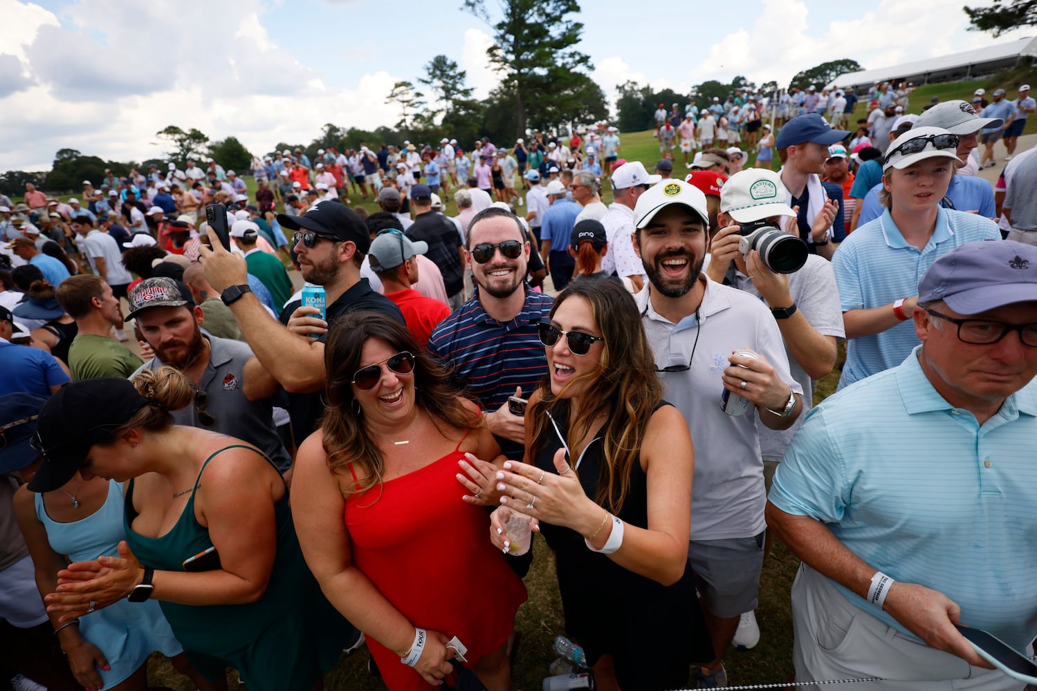 Fans were seen enjoying themselves during the final round of the Tour Championship at East Lake Golf Club on Sunday, Sept. 1, 2024, in Atlanta.

(Miguel Martinez / AJC)