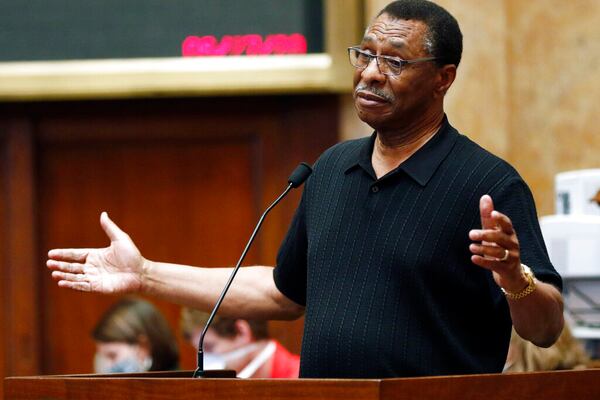 Rep. Ed Blackmon, D-Canton, calls upon lawmakers to consider the suspension of the rules and introduce a bill to take down the state flag, Saturday, June 27, 2020 at the Capitol in Jackson, Miss. The resolution passed as the chamber voted 85-34 for a resolution that now heads to the Senate, where it will also take a two-thirds vote to pass. The current flag has in the canton portion of the banner the design of the Civil War-era Confederate battle flag, that has been the center of a long-simmering debate about its removal or replacement. (AP Photo/Rogelio V. Solis)