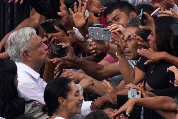 FILE - Mexican President Andrés Manuel López Obrador greets supporters as he arrives at the capital's main square, the Zócalo, in Mexico City, Nov. 27, 2022. (AP Photo/Marco Ugarte, File)