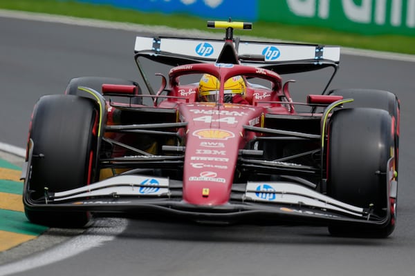 Ferrari driver Lewis Hamilton of Britain steers his car during the third practice session at the Australian Formula One Grand Prix at Albert Park, in Melbourne, Australia, Saturday, March 15, 2025. (AP Photo/Asanka Brendon Ratnayake)