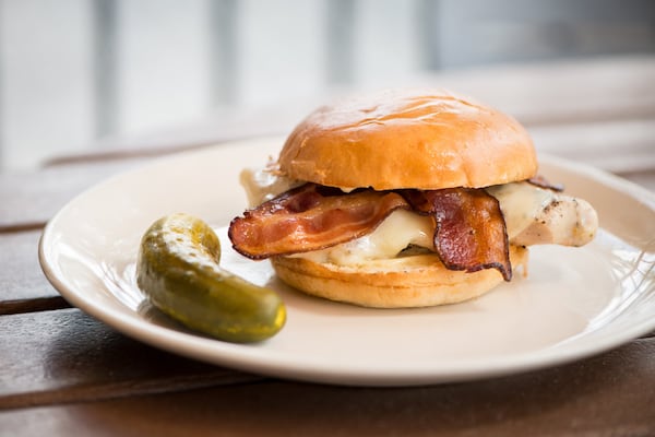 The Funky Chicken sandwich,with brined Big Green Egg-grilled chicken breast, Nueske’s bacon, provolone cheese, truffle aioli, from the menu at Muss & Turner’s. MIA YAKEL