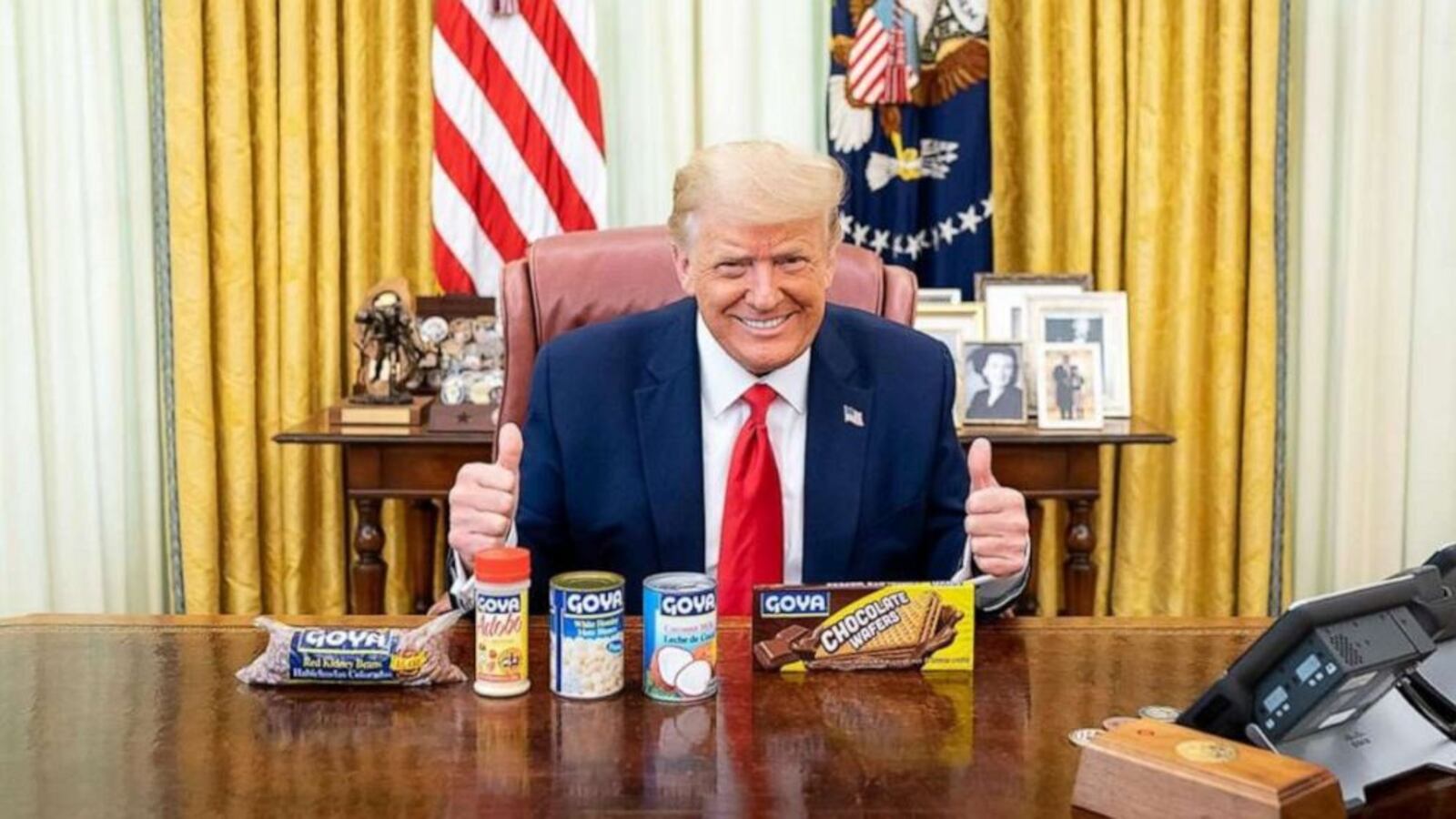 President Donald Trump on Wednesday posted to Instagram an image of himself in the Oval Office, grinning and giving two thumbs up with Goya products sitting on the Resolute desk.