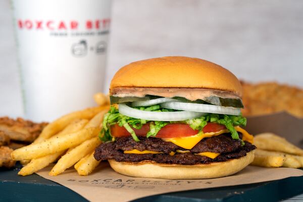 Fries and The Smash Burger which is two smashed patties with melted American cheese, pickles, tomato, lettuce, onion and special sauce.
(Courtesy of Boxcar Betty’s)