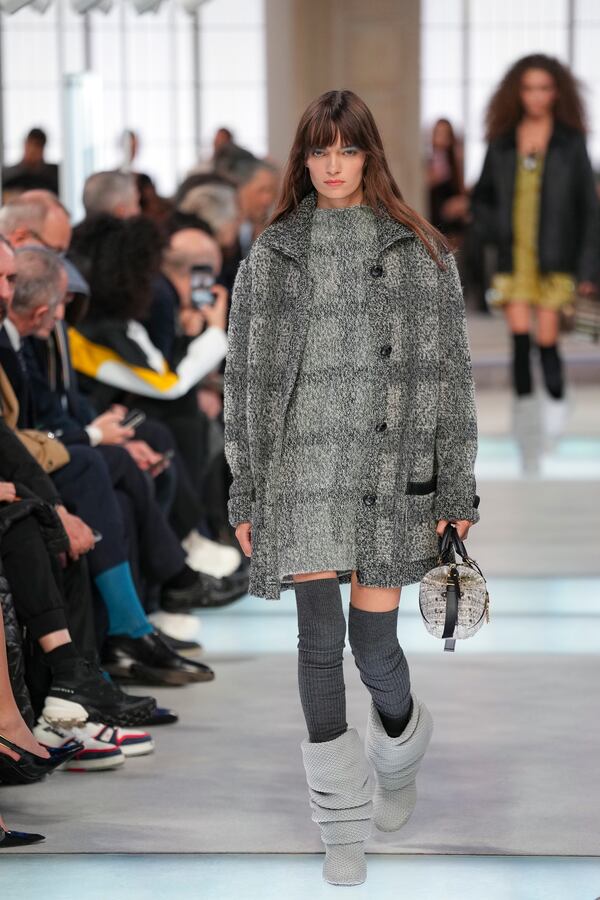 A model wears a creation as part of the Louis Vuitton Fall/Winter 2025-2026 Womenswear collection presented in Paris, Monday, March 10, 2025. (Photo by Scott A Garfitt/Invision/AP)