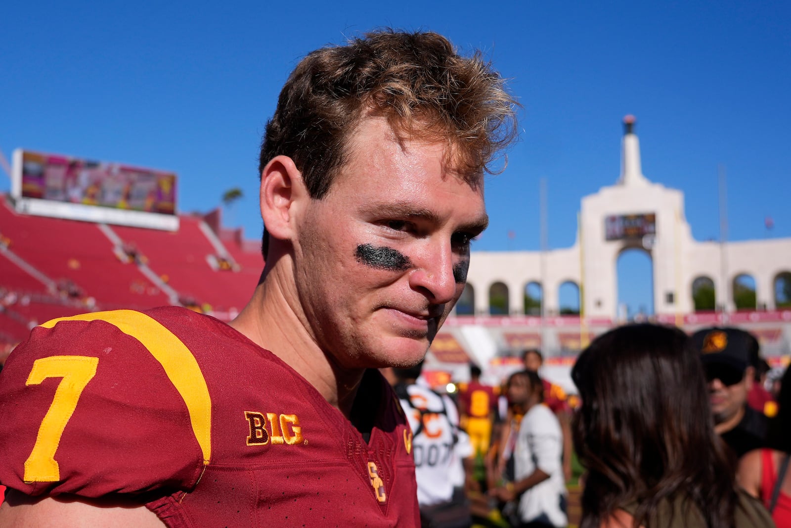 Southern California quarterback Miller Moss walks off the field after USC defeated Wisconsin 38-21 in an NCAA college football game, Saturday, Sept. 28, 2024, in Los Angeles. (AP Photo/Mark J. Terrill)