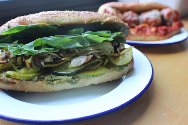 Pizza Jeans Seasonal Veggie Sub with mushrooms, pickled veggies, cucumber on sesame semonlina hoagie roll.