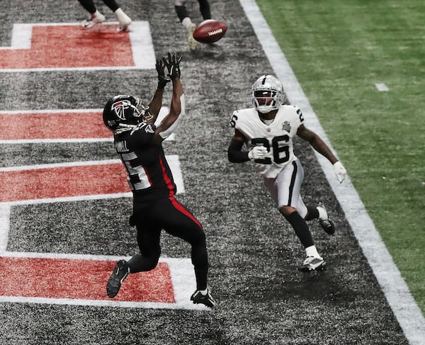 Falcons wide receiver Brandon Powell catches a touchdown pass in the end zone past Las Vegas Raiders cornerback Nevin Lawson during the third quarter Sunday, Nov. 29, 2020, at Mercedes-Benz Stadium in Atlanta. (Curtis Compton / Curtis.Compton@ajc.com)