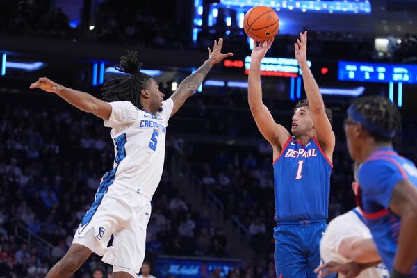 Creighton's Jamiya Neal (5) defends a shot by DePaul's Isaiah Rivera (1) during the second half of an NCAA college basketball game at the Big East basketball tournament Thursday, March 13, 2025, in New York. (AP Photo/Frank Franklin II)