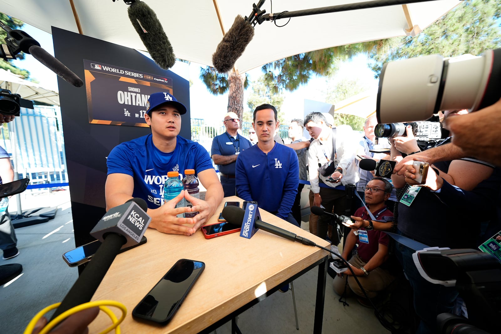 Los Angeles Dodgers' Shohei Ohtani speaks during media day for the baseball World Series against the New York Yankees, Thursday, Oct. 24, 2024, in Los Angeles. (AP Photo/Julio Cortez)