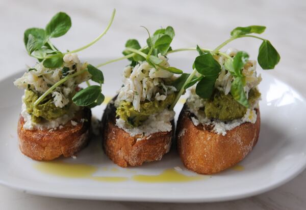 Toast with pea puree, jumbo crab, pea tendrils, mint, parsley and lemon.(Beckysteinphotography.com)