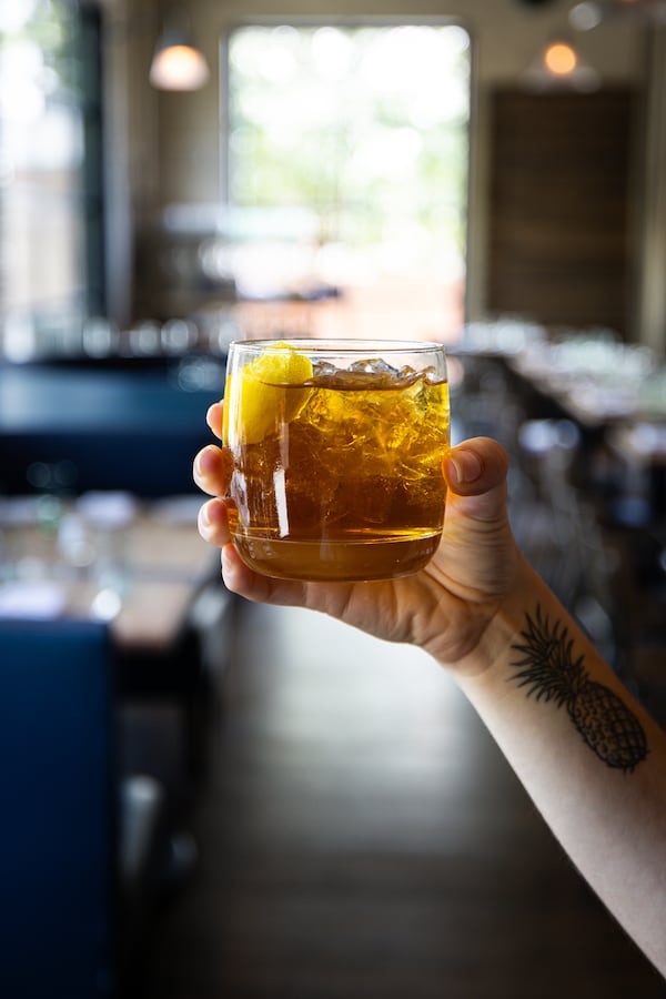 The c'est si bon cocktail combines peach whiskey and the bark, root and herb flavors of bitter liqueurs. (Courtesy of Rocket Farm Restaurants)