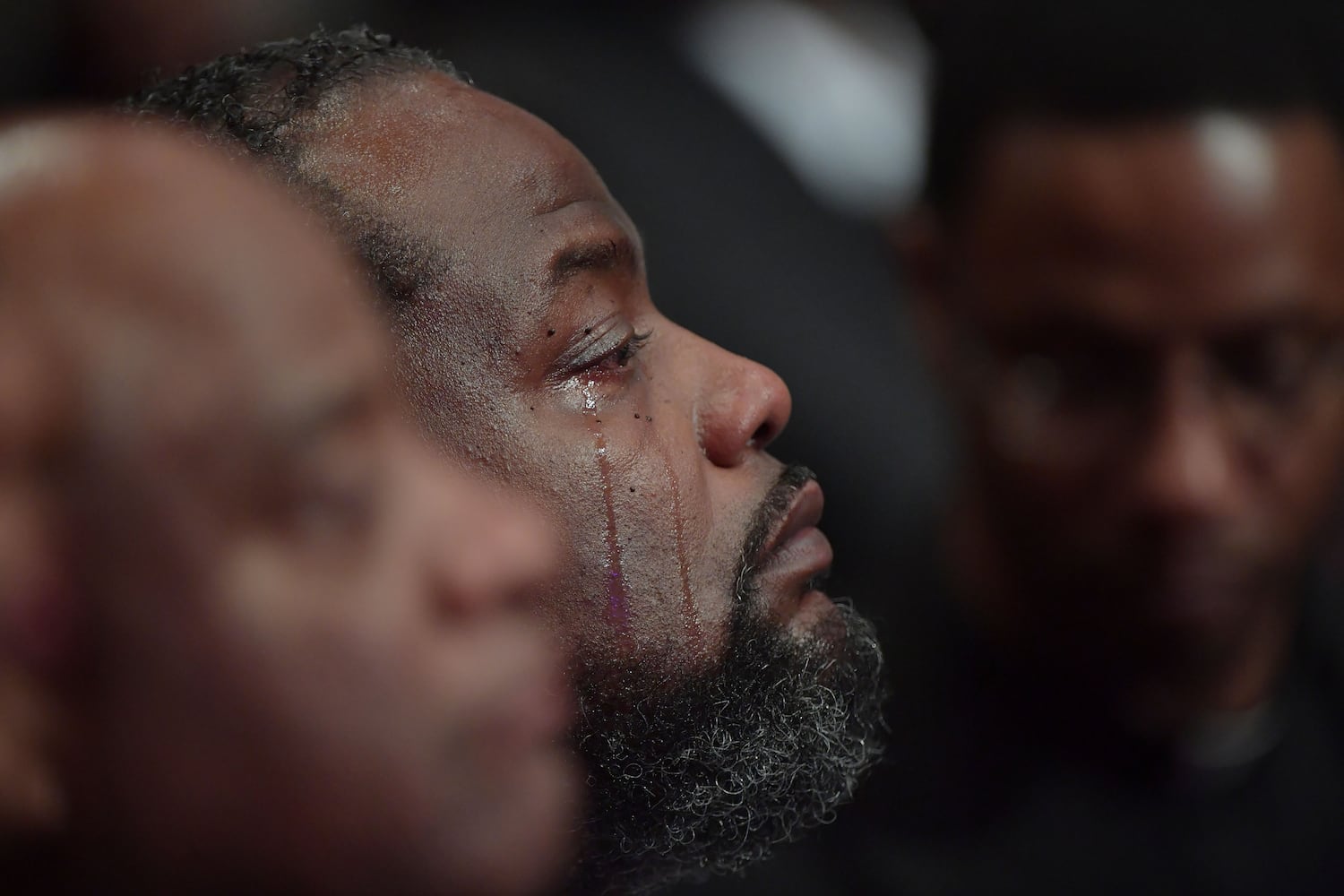 Mourners attend the funeral of Bishop Eddie Long