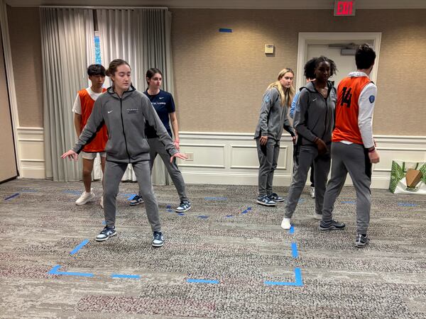 Columbia players walk through plays in their hotel in Chapel Hill, N.C., Wednesday, March 19, 2025, before their First Four basketball game in the NCAA Tournament against Washington on March 20. (AP Photo/Doug Feinberg)