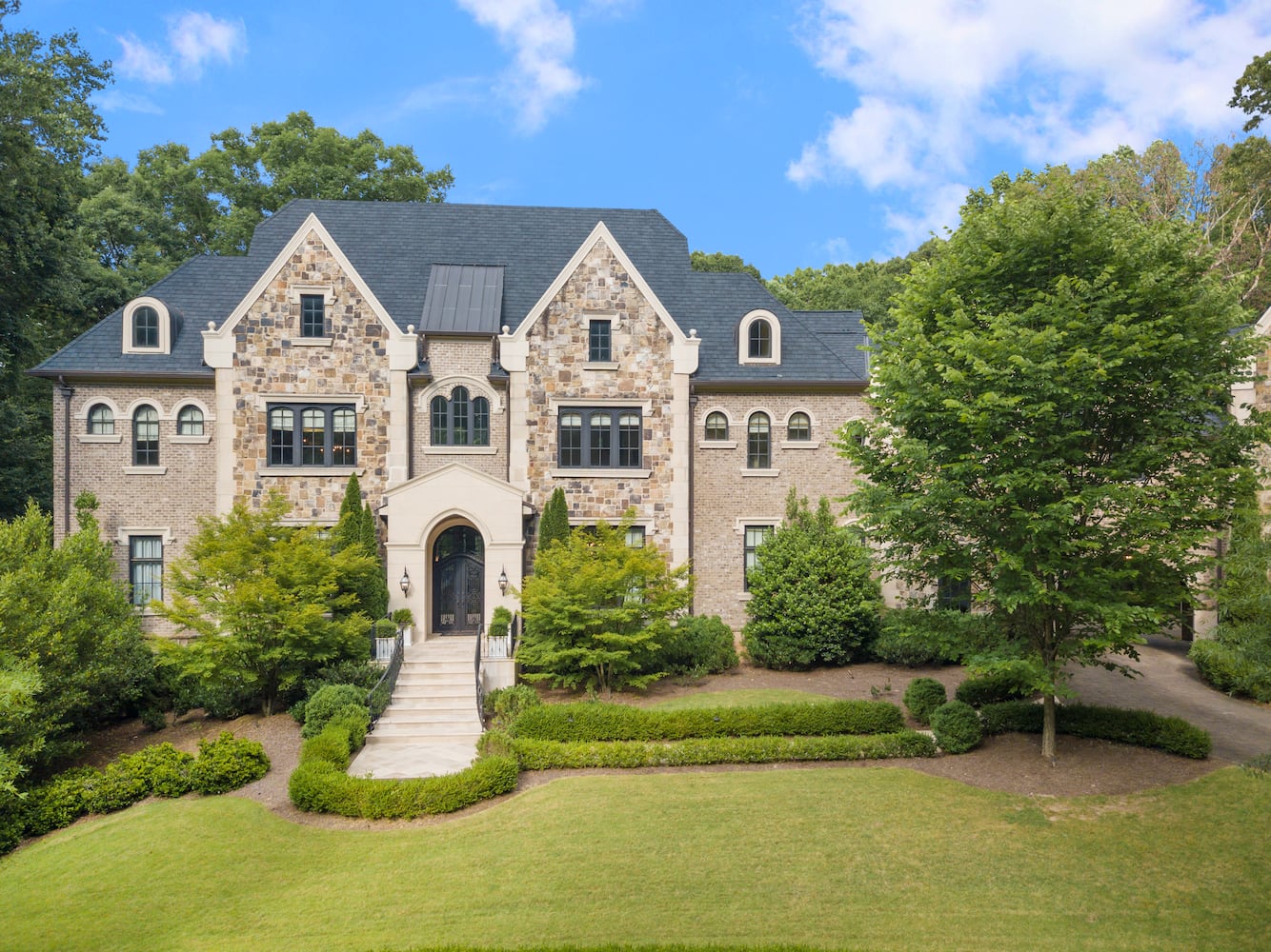 Live in luxury in 8-bedroom $4.5 million custom Sandy Springs manor