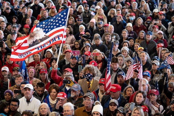 About 1,000 people turned out for a rally Wednesday in Alpharetta where former Trump attorney Sidney Powell encouraged them to boycott Georgia's U.S. Senate runoffs on Jan. 5. (Ben Gray/Atlanta Journal-Constitution/TNS)