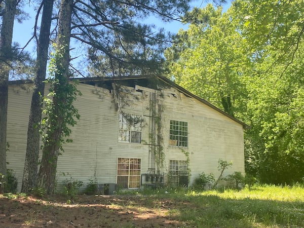 One of the buildings at Brannon Hill Condominiums. DeKalb County has demolished multiple units due to fire damage and being blighted properties.