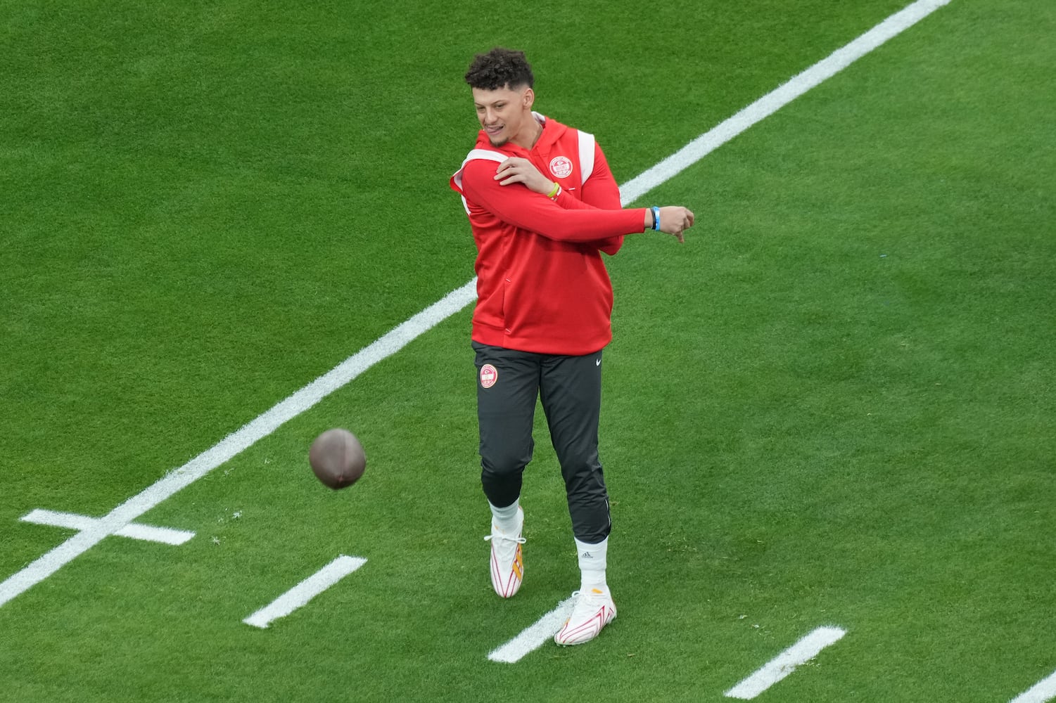 Kansas City Chiefs quarterback Patrick Mahomes warms up before the start of Super Bowl LVIII at Allegiant Stadium in Las Vegas on Sunday, Feb. 11, 2024. (Doug Mills/The New York Times)