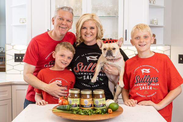 The entire Sullivan family —Benjamin (from left), Jacob, Kristen, Tyler and their dog Pickles — promotes Sully’s Slammin’ Fresh salsa. Courtesy of Jessica Griggs