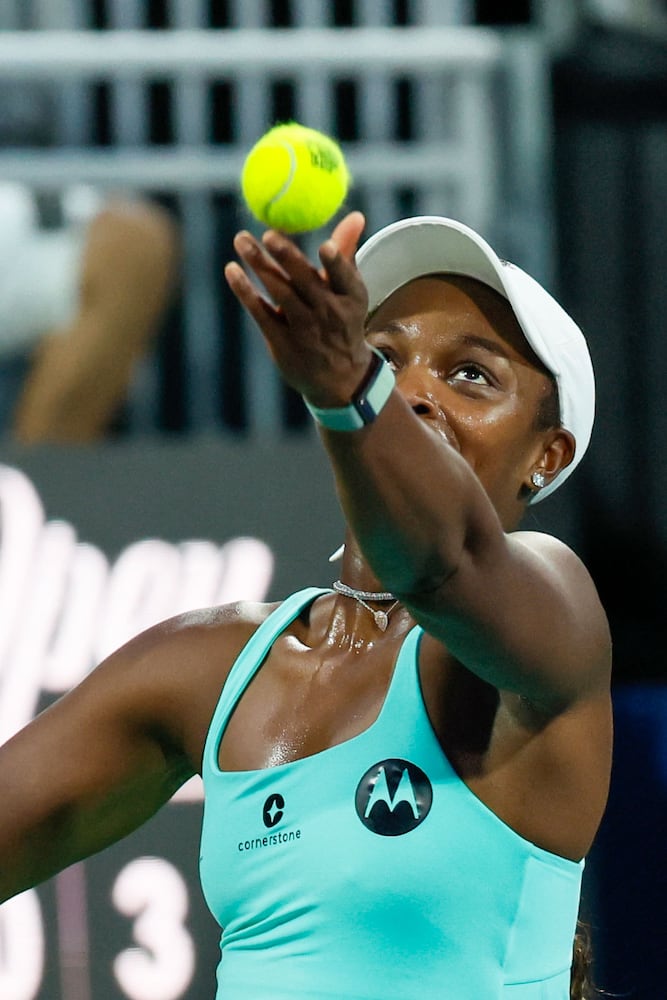 Sloane Stephens toses the ball for a serve against Taylor Townsend during an exhibition match in the Atlanta Open at Atlantic Station on Sunday, July 21, 2024, in Atlanta,
(Miguel Martinez / AJC)