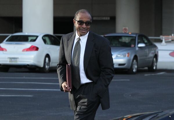 Contractor Elvin “E.R.” Mitchell Jr. returns to his car after pleading guilty in January in the Atlanta bribery scandal. (HENRY TAYLOR / HENRY.TAYLOR@AJC.COM)