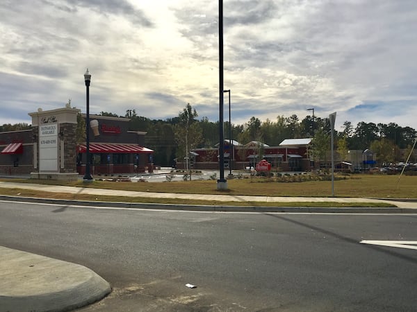 Recent and current construction on Scenic Highway in Snellville and Lawrenceville has included a new Cook Out restaurant, an upcoming Cracker Barrel and a soon-to-open dine-in movie theater. TYLER ESTEP / TYLER.ESTEP@COXINC.COM