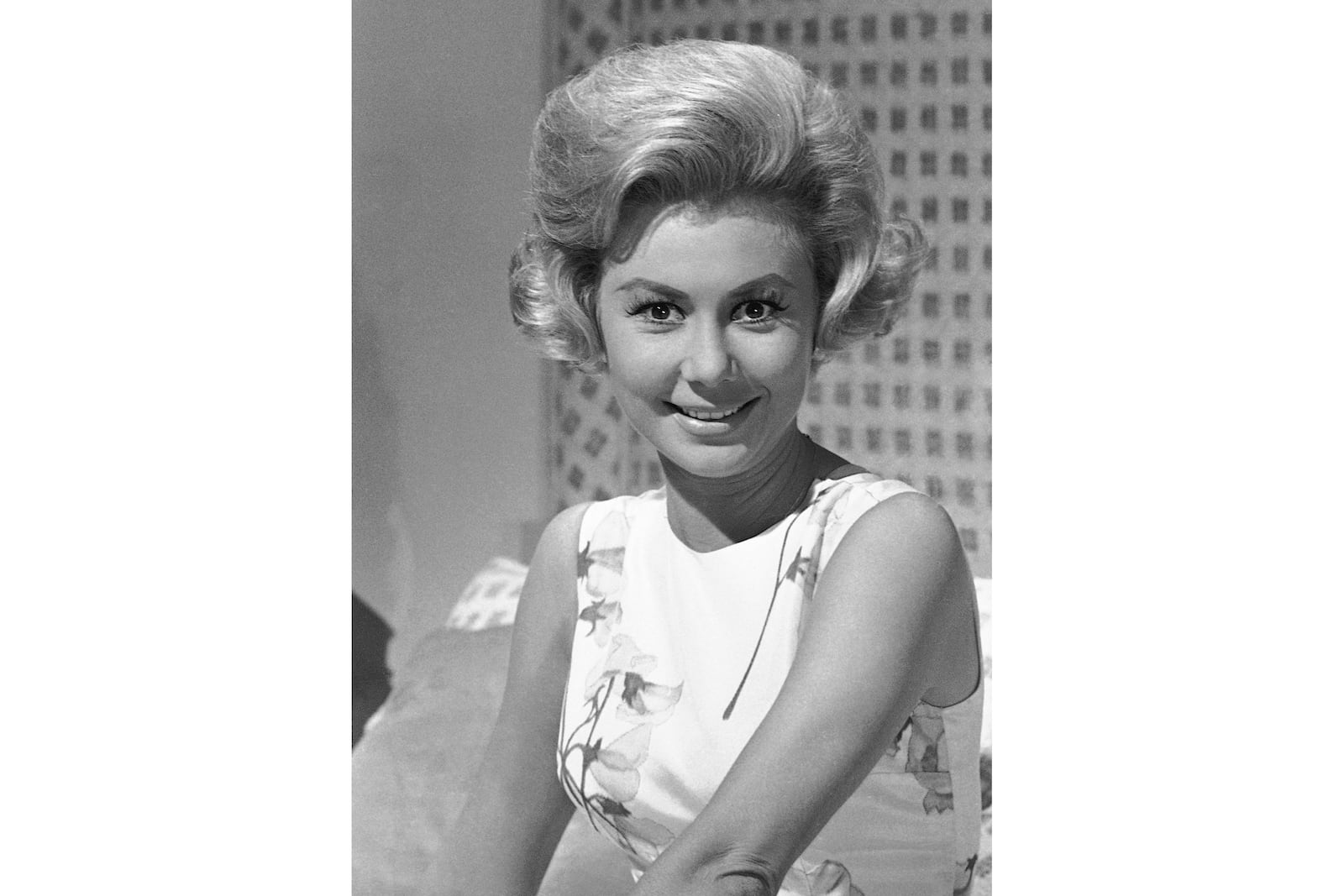 FILE - Mitzi Gaynor appears in Los Angeles on Oct. 10, 1962. (AP Photo/Don Brinn, File)