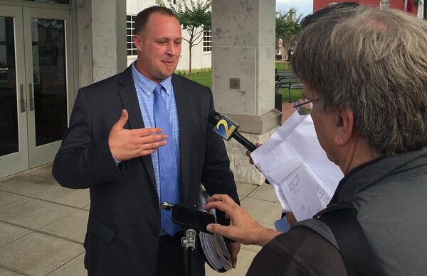 Mark Thomason speaks to reporters after the hearing last year. (Chris Joyner / cjoyner@ajc.com)