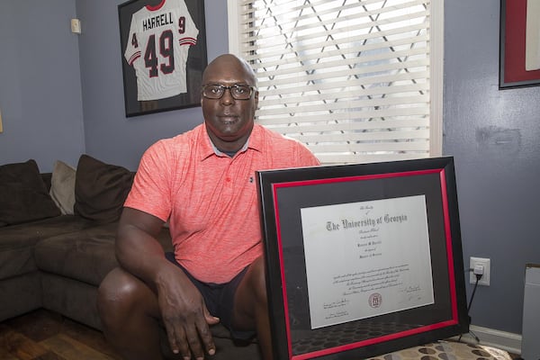 Former NFL San Diego Chargers player Maurice Harrell sits for a portrait at his residence in Decatur on July 2. Harrell is having trouble finding a job in his field, sports management. He received his undergraduate and graduate degree from the University of Georgia. (Alyssa Pointer/alyssa.pointer@ajc.com)