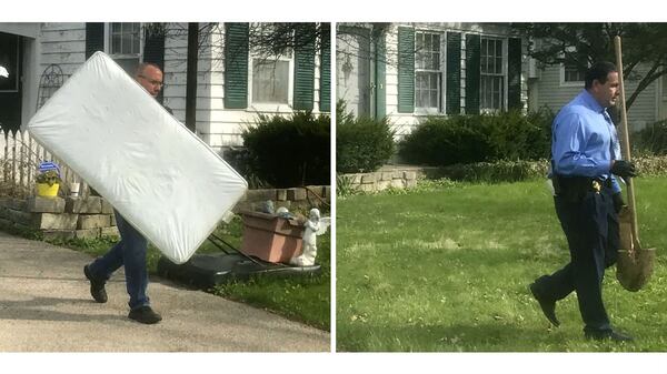 Police officers remove a child-sized mattress and a shovel April 24, 2019, from the Crystal Lake, Ill., home of JoAnn Cunningham and Andrew Freund Sr.