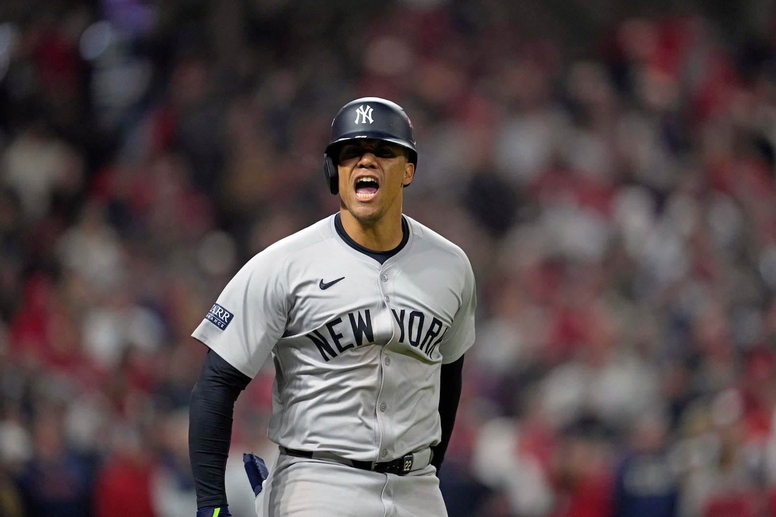 New York Yankees' Juan Soto celebrates after hitting a three-run home run against the Cleveland Guardians during the 10th inning in Game 5 of the baseball AL Championship Series Saturday, Oct. 19, 2024, in Cleveland. (AP Photo/Godofredo A. Vásquez)