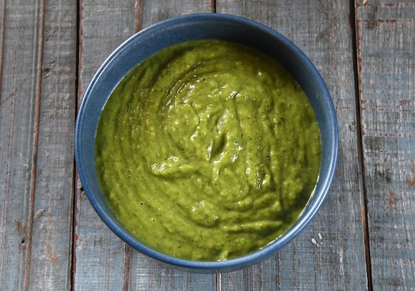 Avocado Tomatillo Salsa, a recommended topping for Enchilada Lasagna Burgers, can step up your salsa game in general. (Styling by Claudine Molson-Sellers / Chris Hunt for the AJC)