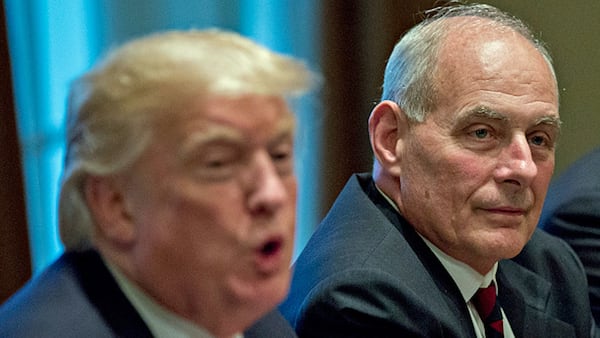 White House chief of staff John Kelly listens as President Donald Trump speaks at a briefing with senior military leaders in the Cabinet Room of the White House October 5, 2017 in Washington, D.C. 