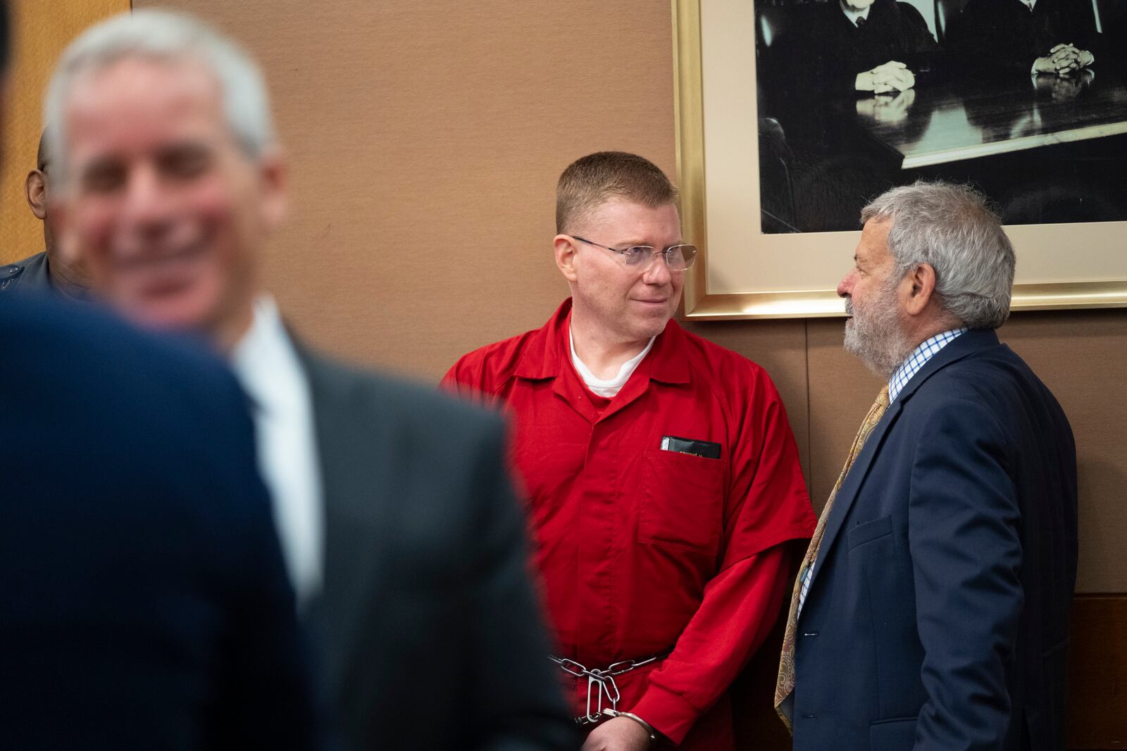 Bryan Keith Schmitt talks to attorney Don Samuel in Fulton Superior Court after a hearing where he was granted bond Thursday, July 25, 2024.   (Ben Gray / Ben@BenGray.com)