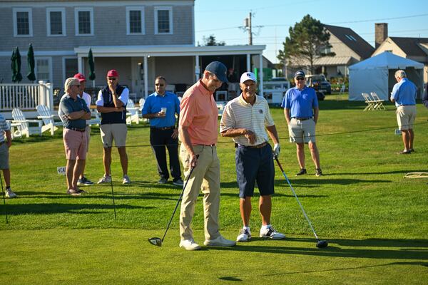 Rusty Strawn (left) and Doug Hanzel chat on the first hole before their final match at the 2022 U.S. Senior Amateur at The Kittansett Club in Marion, Mass., on Thursday. (Kathryn Riley/USGA)