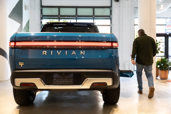 A Rivian R1T truck is seen at a media event marking the opening of the company’s new showroom at Ponce City Market in Atlanta on Thursday, Oct. 19, 2023. (Arvin Temkar / arvin.temkar@ajc.com)