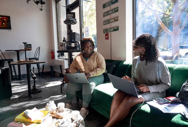 Marasia Tickles (left), graduated from Tuskegee University, chats with Abigail Reese-Kelley at Brooklyn Tea, Friday, October 11, 2024, in Atlanta. (Hyosub Shin / AJC)