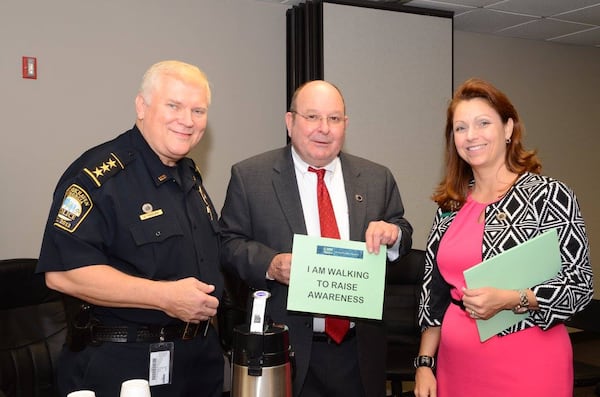 Brookhaven Police Chief Gary Yandura, Georgia Bureau of Investigation Director Vernon Keenan and National Alliance of Mental Illness Georgia Executive Director Kim Jones encourage law enforcement officials from around the state to participate in a challenge to raise money for Crisis Intervention Training through NAMIWalks. (Credit: NAMI Georgia)